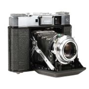 Câmera analógica médio-formato Zeiss Ikon Super Ikonta (534/16) com lente Tessar 75mm f3.5 - USADO